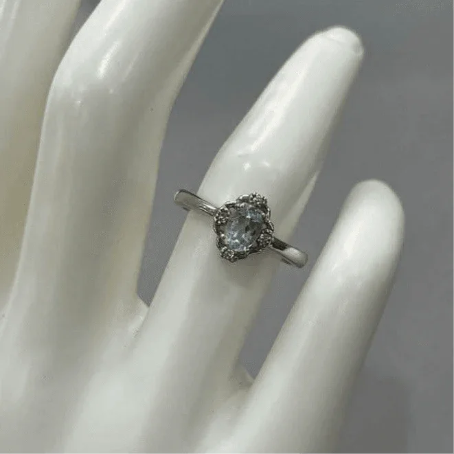 Enigmatic Blue Topaz: Sterling Silver Shiny Ring