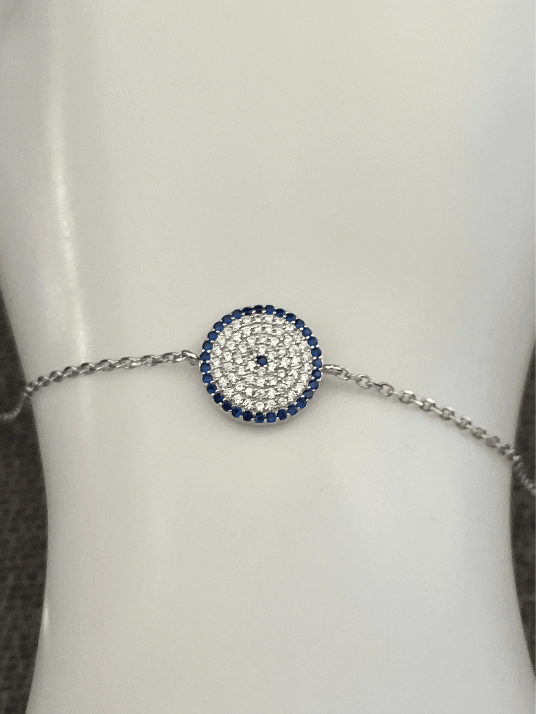 Sterling Silver Circle Bracelet with Blue Dot – A Modern Symbol of Unity