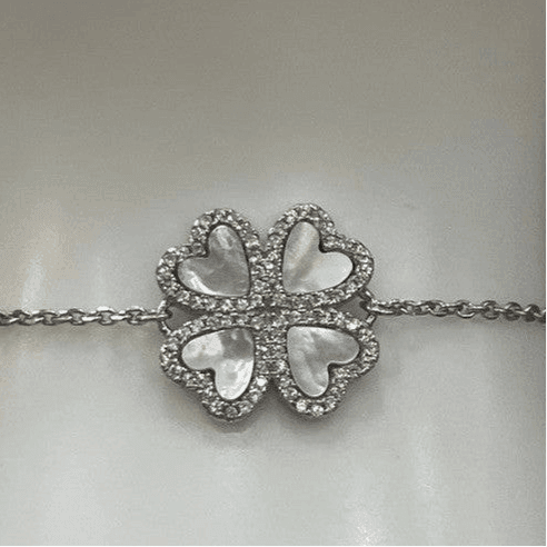 Timeless Elegance: The Sterling Silver Four-Petal Flower Bracelet