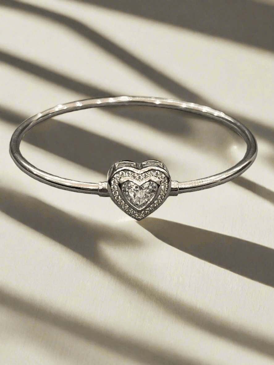Heartfelt Radiance: Sterling Silver Heart Bangle