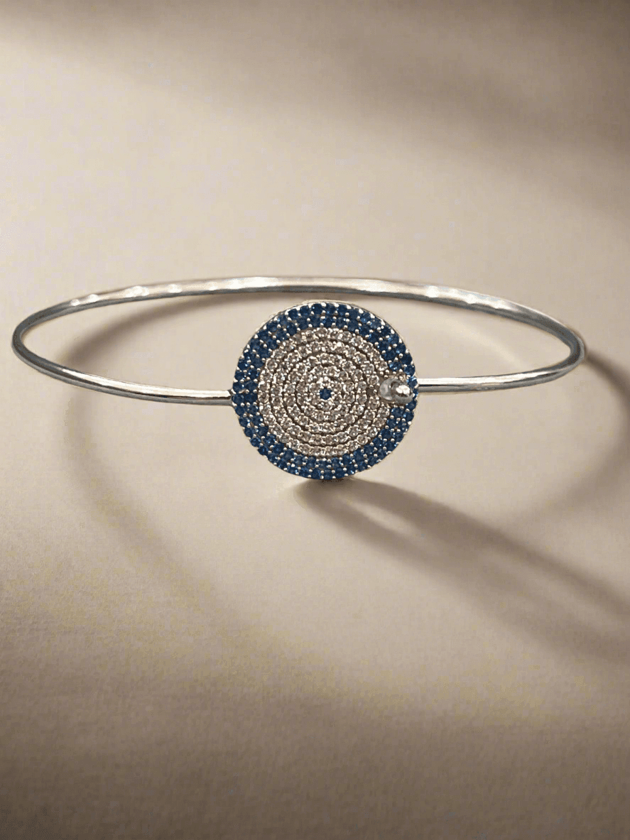 Sapphire Cascade: Sterling Silver Bangle with Blue Zirconia and Diamond Layers