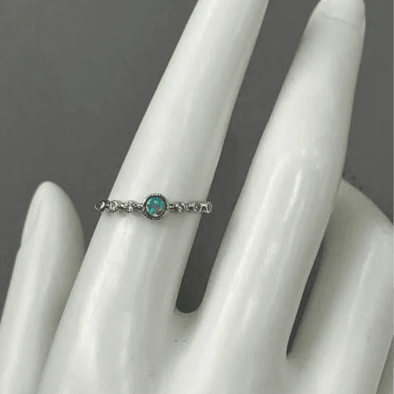 Azure Brilliance: Sterling Silver Ring with Light Turquoise Zirconia