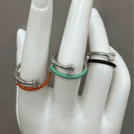 Tricolor Radiance: Sterling Silver Ring with Black, Orange, and Green Accents