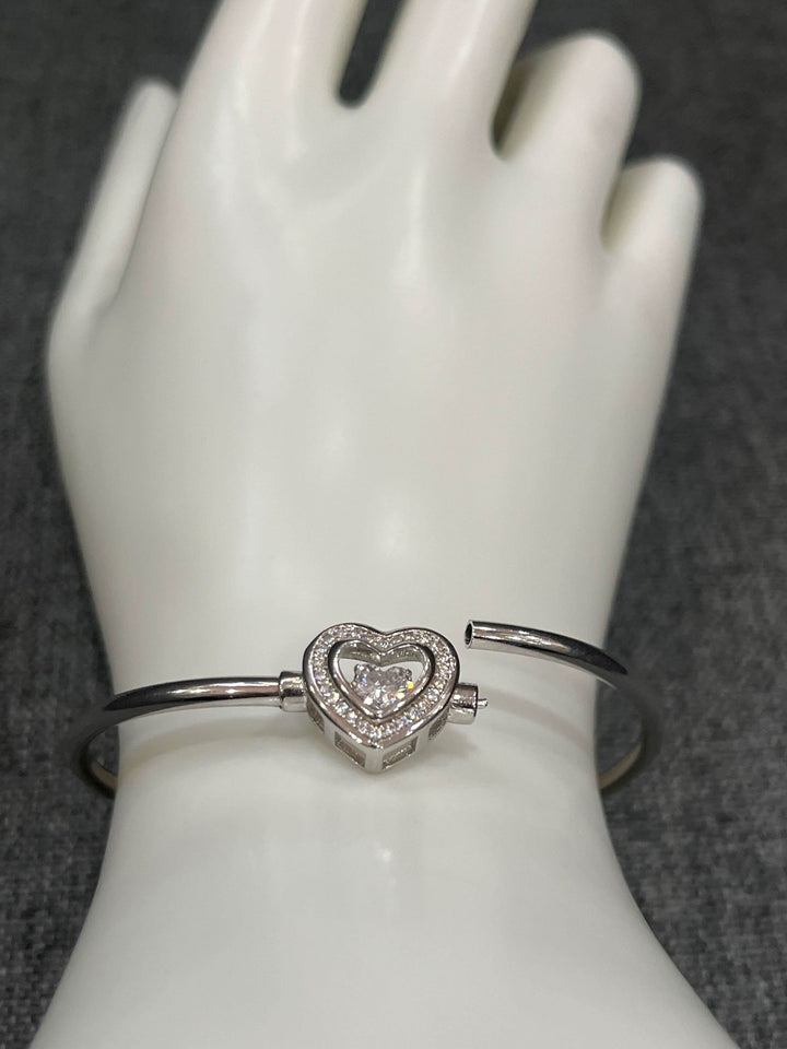 Heartfelt Radiance: Sterling Silver Heart Bangle - Saras Beads & Jewellery
