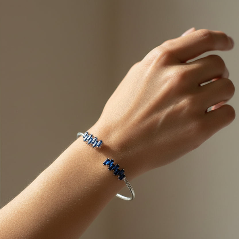 Sterling Silver Bangle with Blue Zirconia Strikes – A Bold Statement Piece