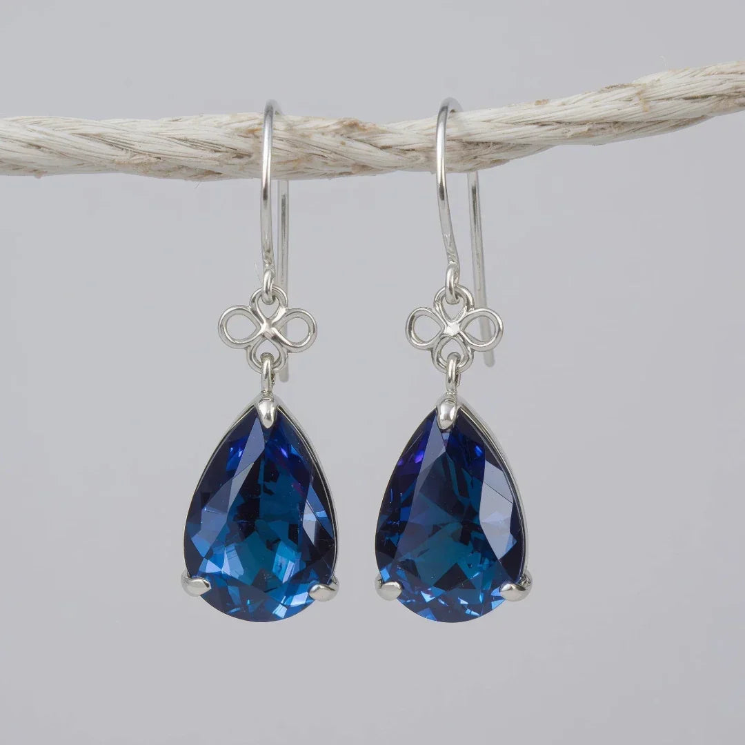  Sterling silver earrings, crafted from high-quality sterling silver, offer both durability and a beautiful shine that can complement any style. 