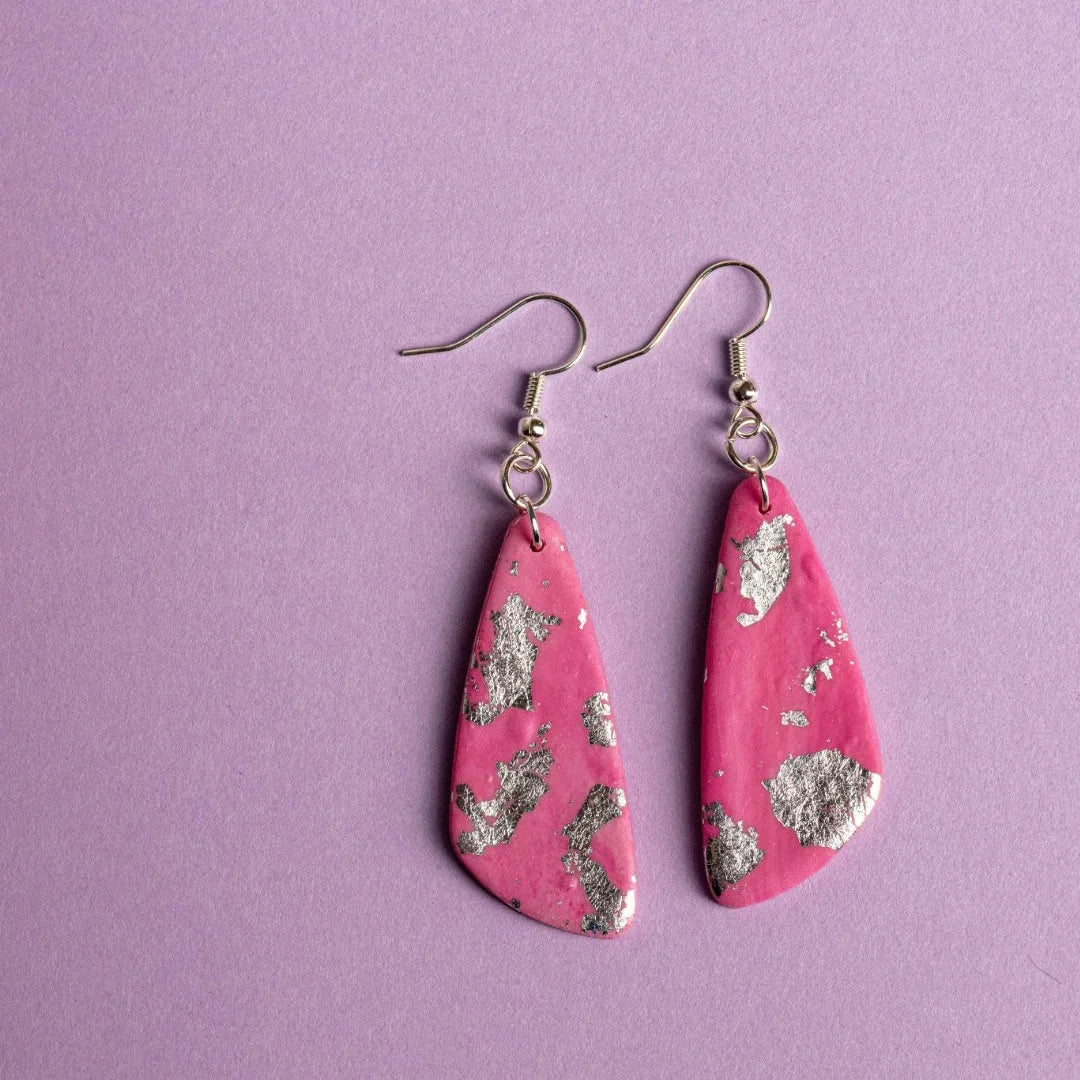 These unique sterling silver earrings are thoughtfully designed to make a bold statement while adding a touch of elegance to your jewellery collection