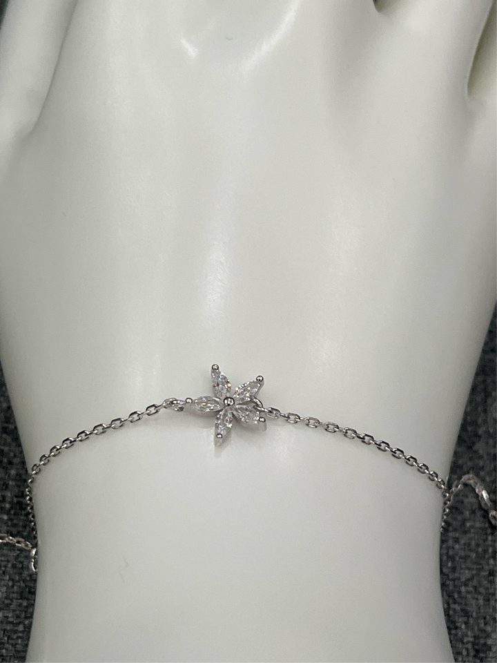 Sterling Silver Bloom Star Bracelet – A Radiant Touch of Elegance