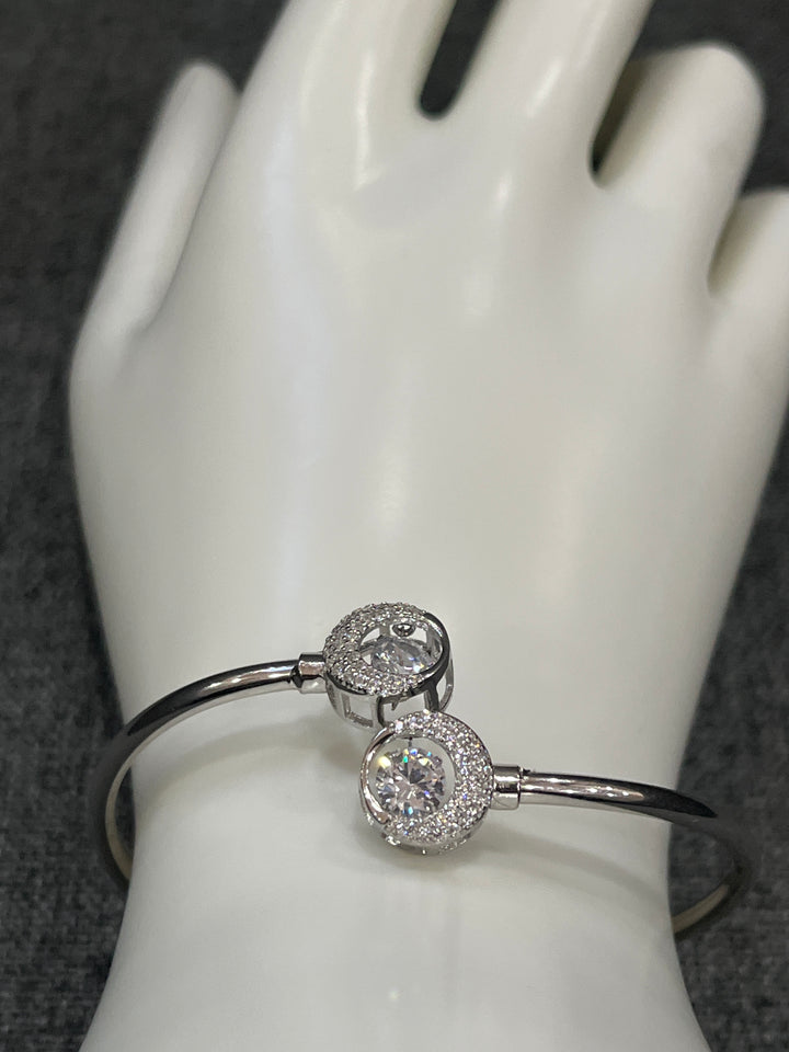 Radiant Circles: Sterling Silver Diamond Bangle