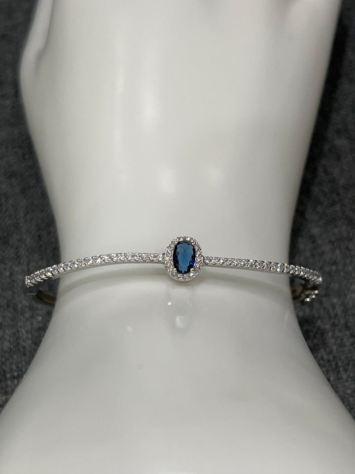 Sterling Silver Bangle with Sapphire Zirconia – Classic Elegance with a Modern Twist