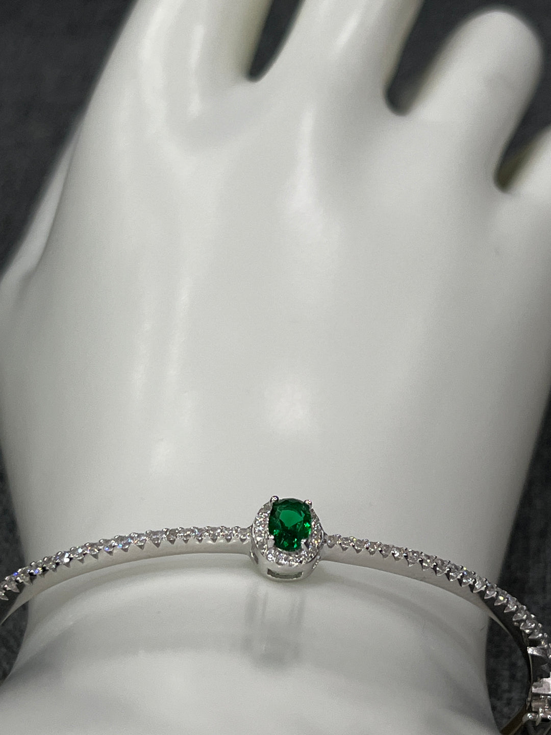 Sterling Silver Bangle with Emerald Zirconia – Classic Elegance with a Modern Twist