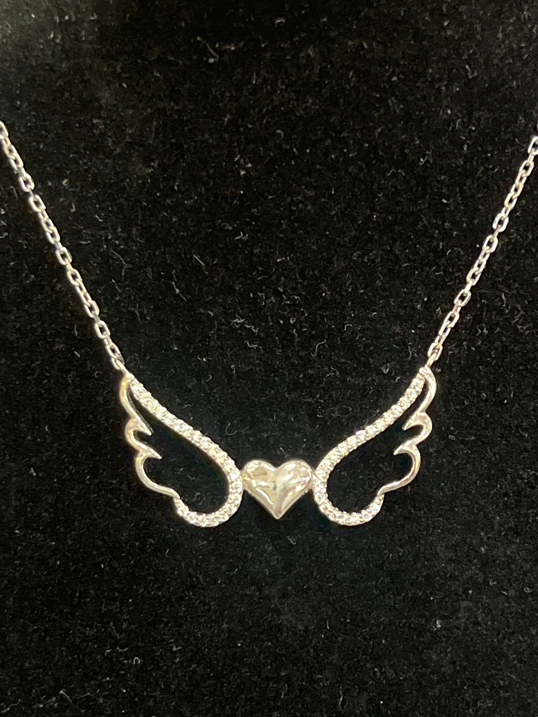 Divine Love: Rhodium-Plated Sterling Silver Angel with Heart Necklace