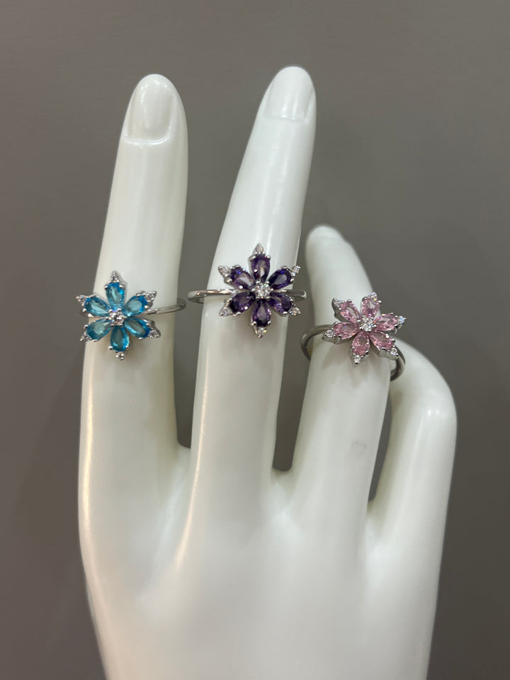 Floral Elegance: Sterling Silver Flower Rings with Turquoise, Purple & Pink Accents