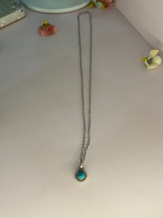 Radiant Turquoise: Sterling Silver Necklace with Sun Vibes