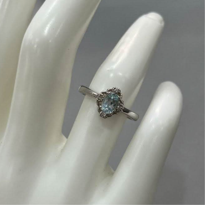 Enigmatic Blue Topaz: Sterling Silver Shiny Ring