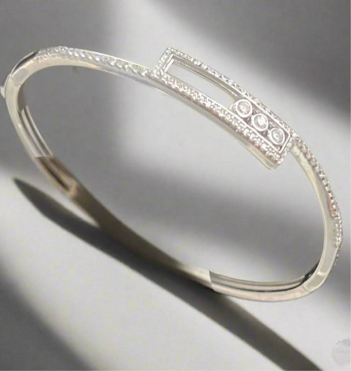 Trinity Sparkle: Rhodium-Plated Sterling Silver Bangle with Triple Dot Zirconia