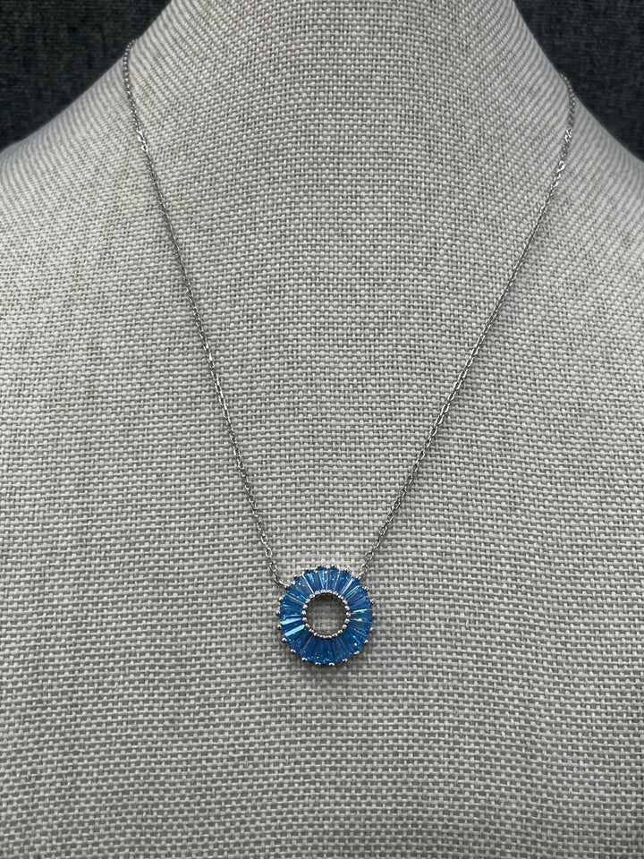 Celestial Elegance: Sterling Silver Necklace with Shiny Blue Orbit Design