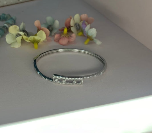 Trinity Sparkle: Rhodium-Plated Sterling Silver Bangle with Triple Dot Zirconia
