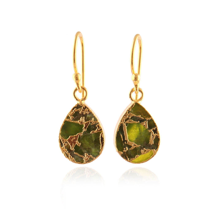 Gold earrings with green teardrop-shaped stones on a white background