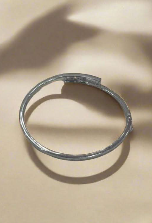 Trinity Sparkle: Rhodium-Plated Sterling Silver Bangle with Triple Dot Zirconia