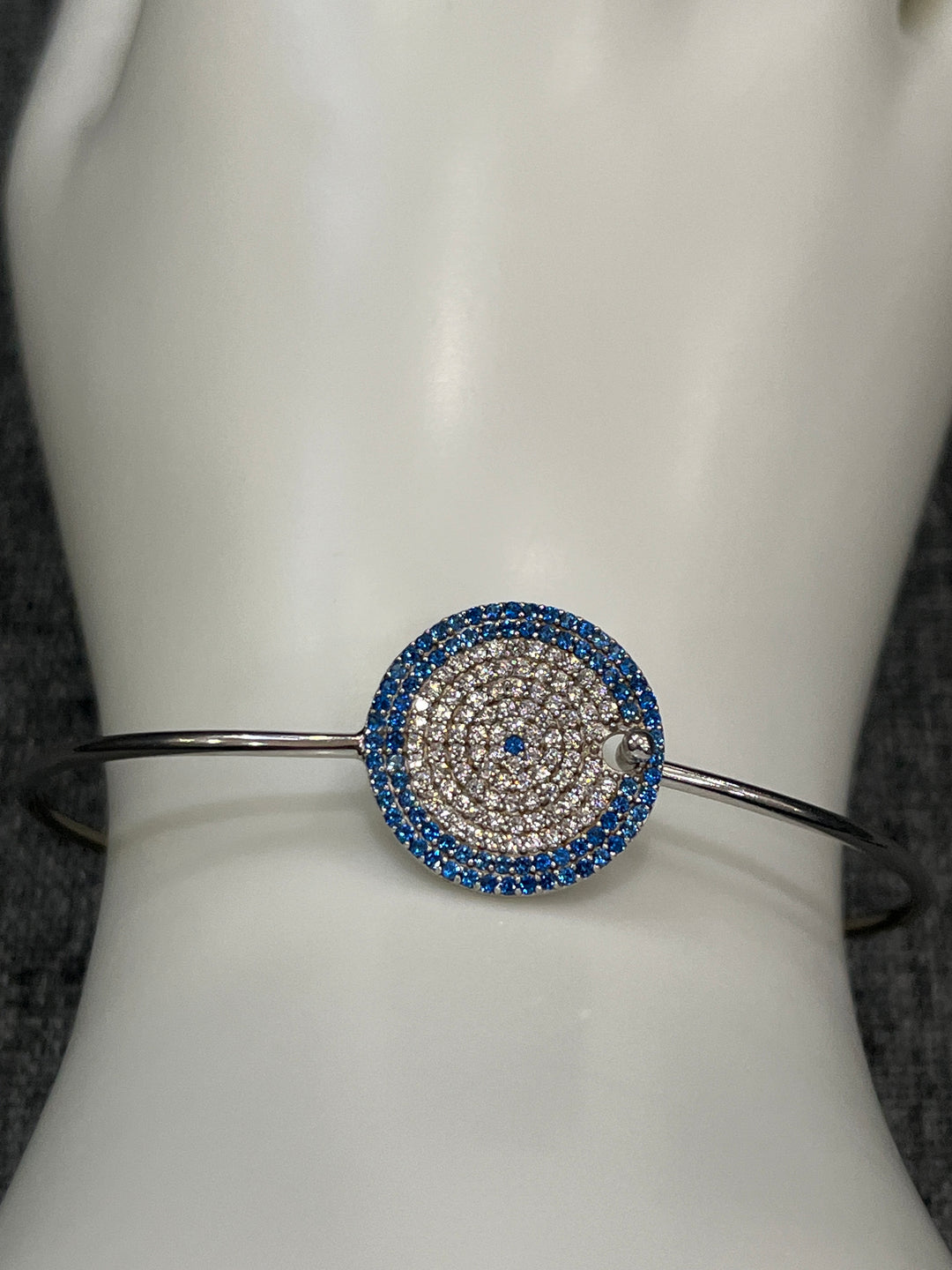 Sapphire Cascade: Sterling Silver Bangle with Blue Zirconia and Diamond Layers