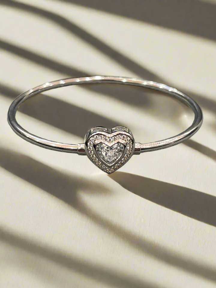 Heartfelt Radiance: Sterling Silver Heart Bangle