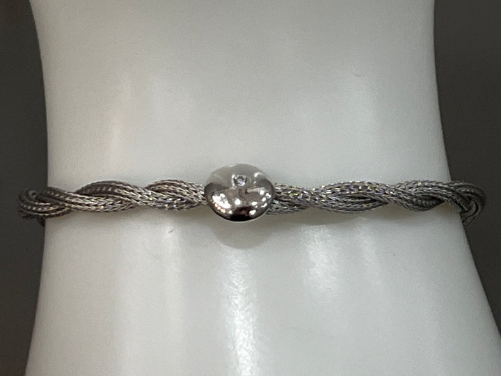 Singular Spark: Sterling Silver Round Bracelet