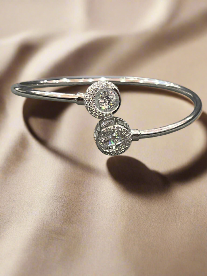 Radiant Circles: Sterling Silver Diamond Bangle