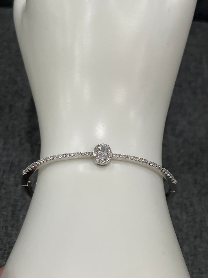 Sterling Silver Bangle with Diamond Zirconia – Classic Elegance with a Modern Twist