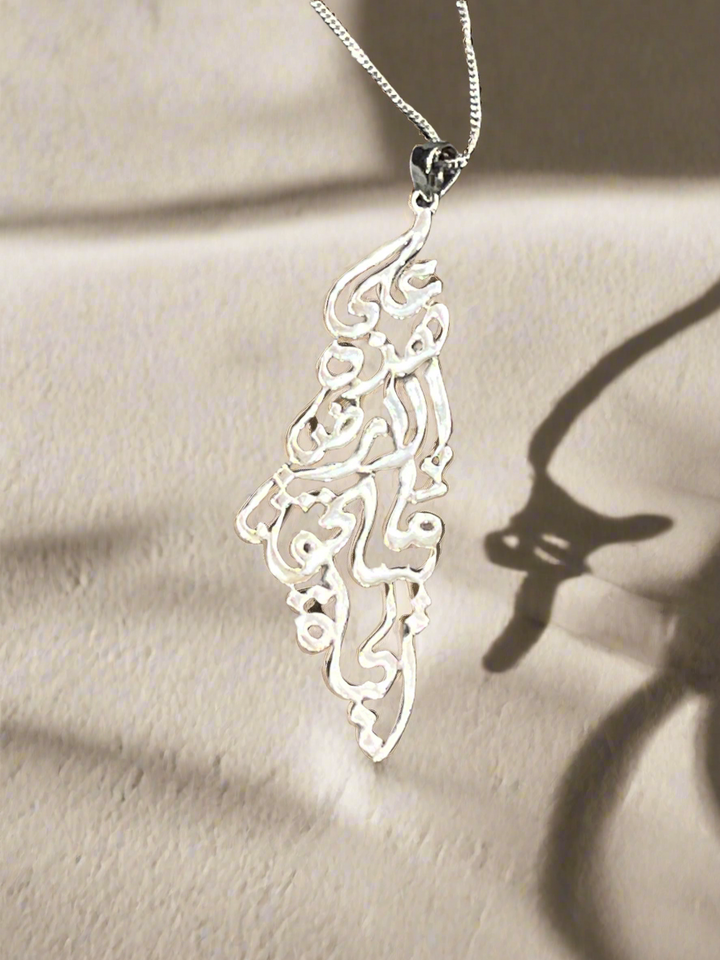 Engraved in Arabic Palestine Map Necklace – A Symbol of Heritage and Identity: On this land it is worth living