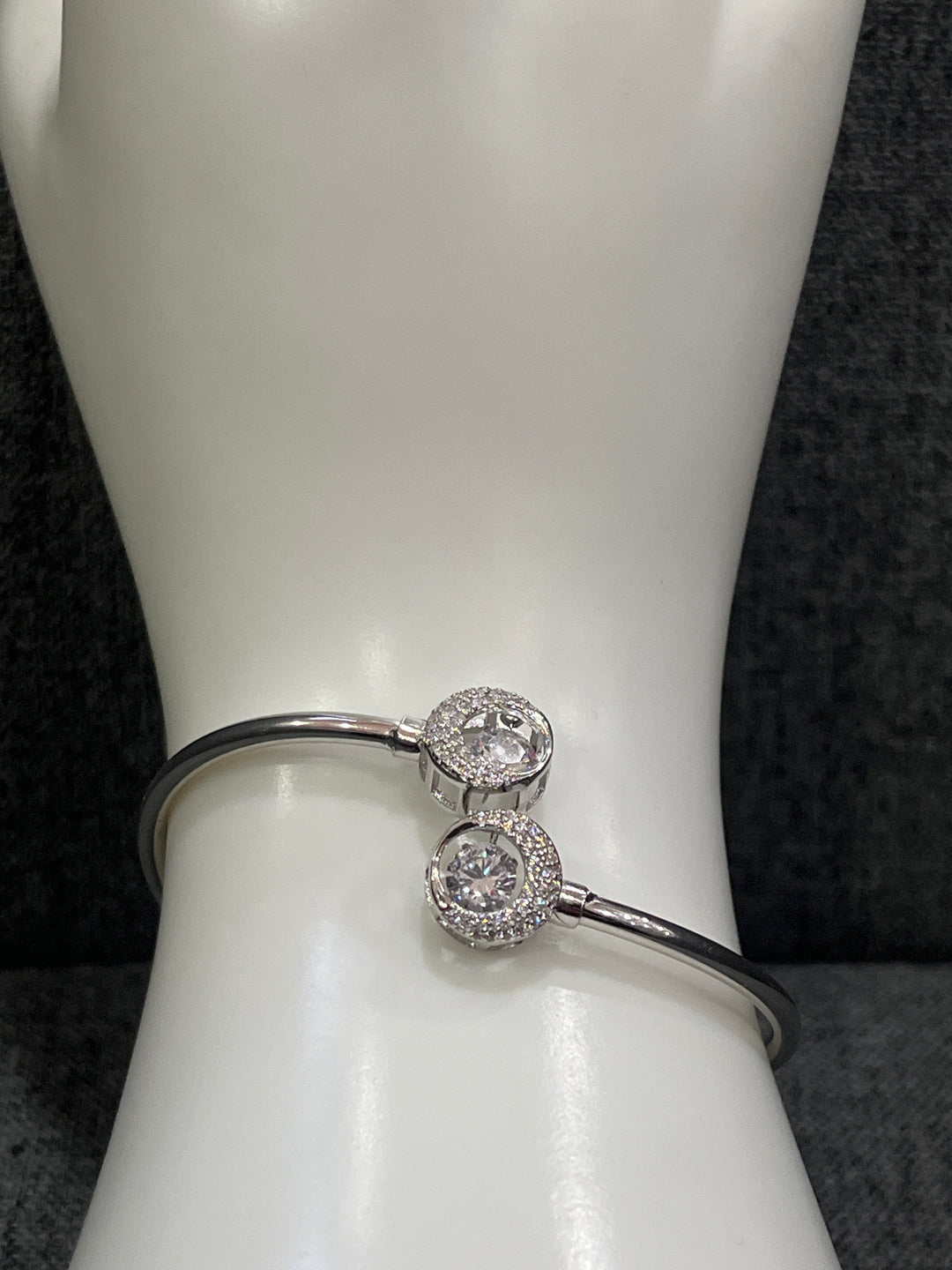 Radiant Circles: Sterling Silver Diamond Bangle