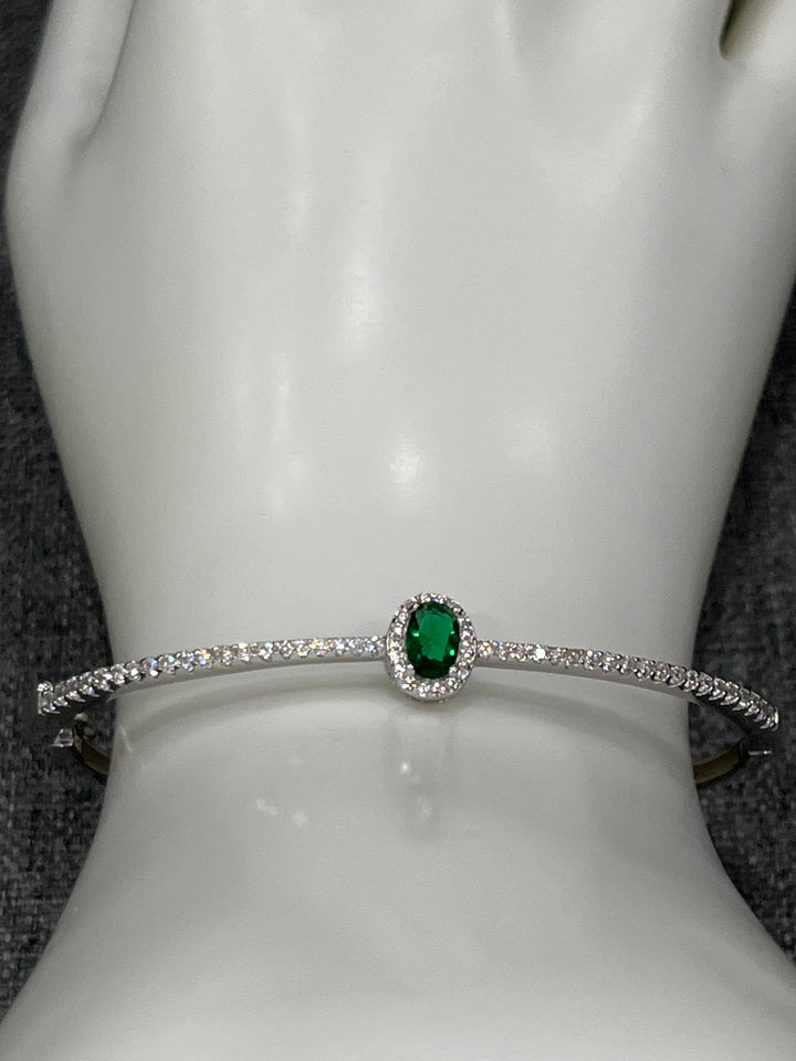 Sterling Silver Bangle with Emerald Zirconia – Classic Elegance with a Modern Twist