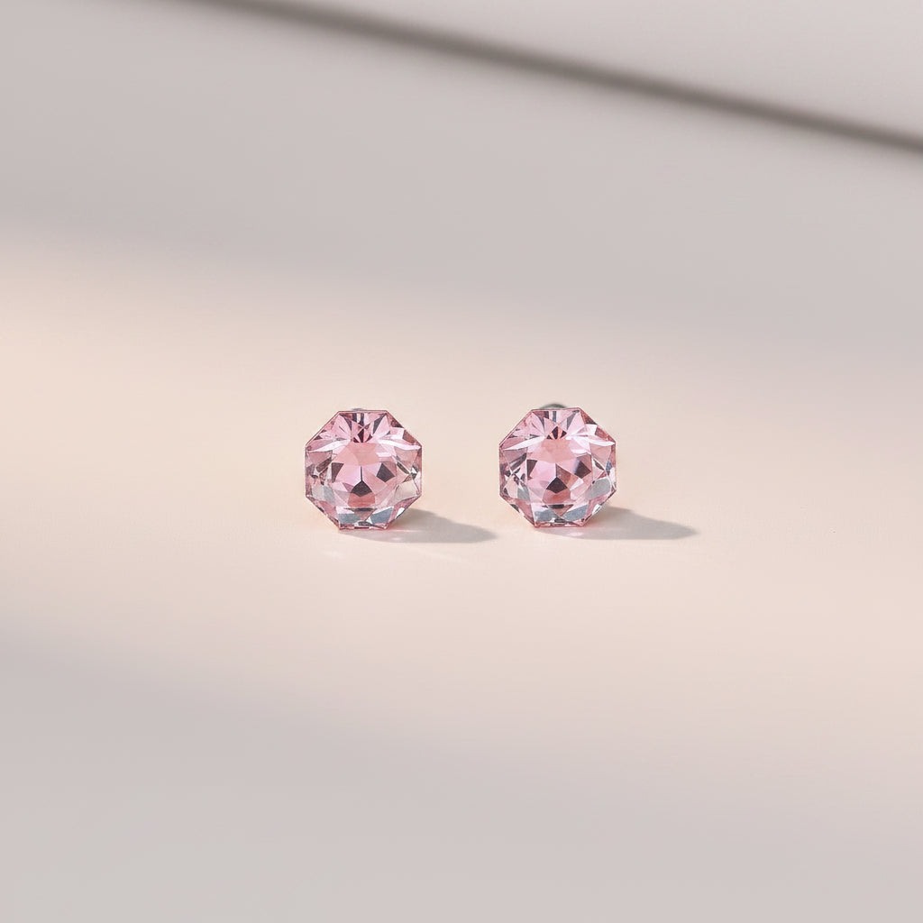 Pink studs with secure buckle in the back
