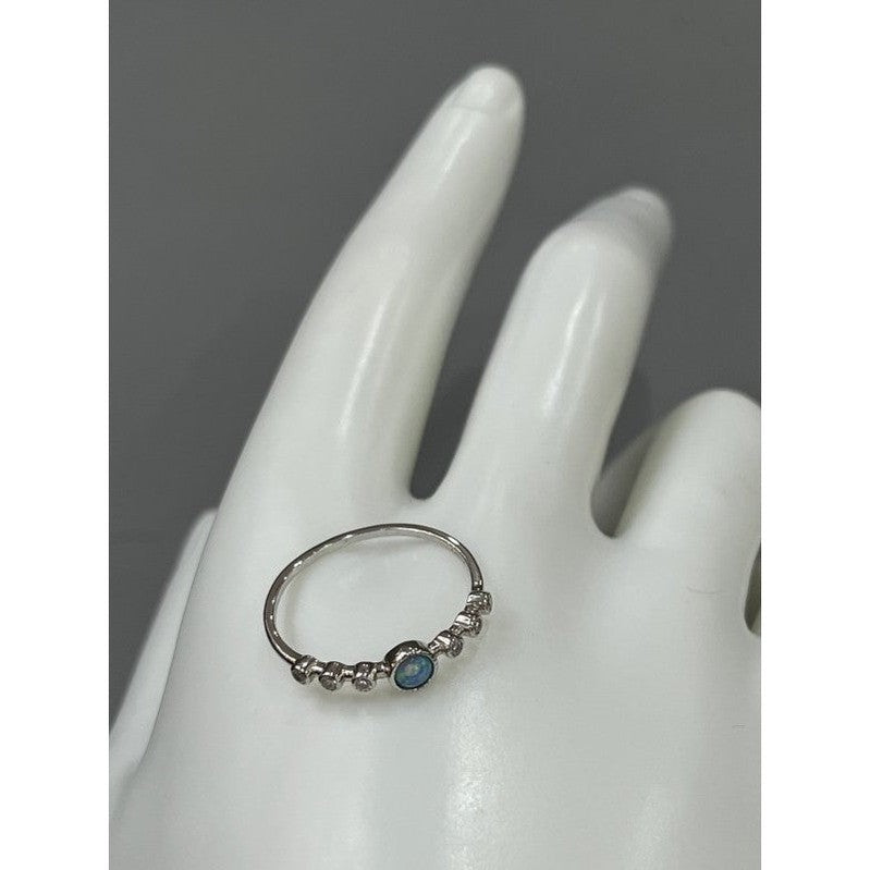 Azure Brilliance: Sterling Silver Ring with Light Blue Stone