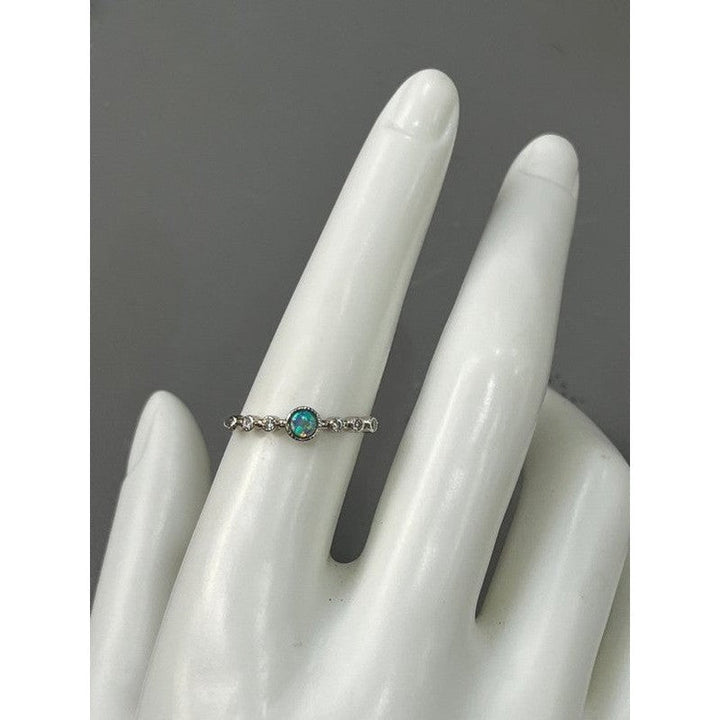 Azure Brilliance: Sterling Silver Ring with Light Blue Stone