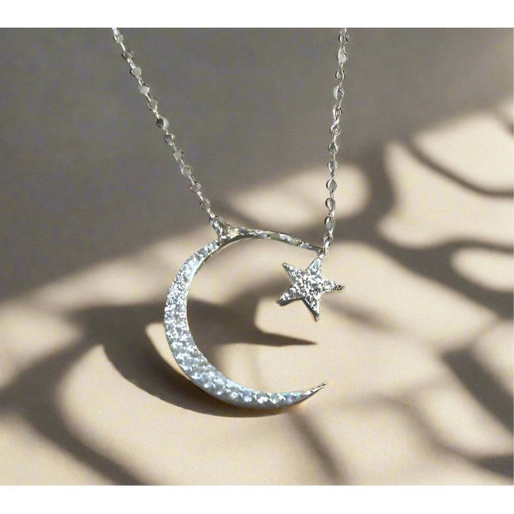 Celestial Crescent: Sterling Silver Moon and Star Necklace