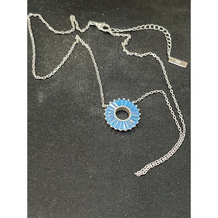 Celestial Elegance: Sterling Silver Necklace with Blue Orbit Design