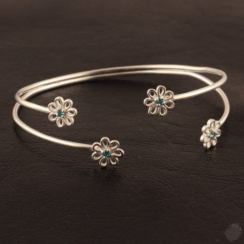 Emerald or a Blue Topaz Four Daisies Bangle