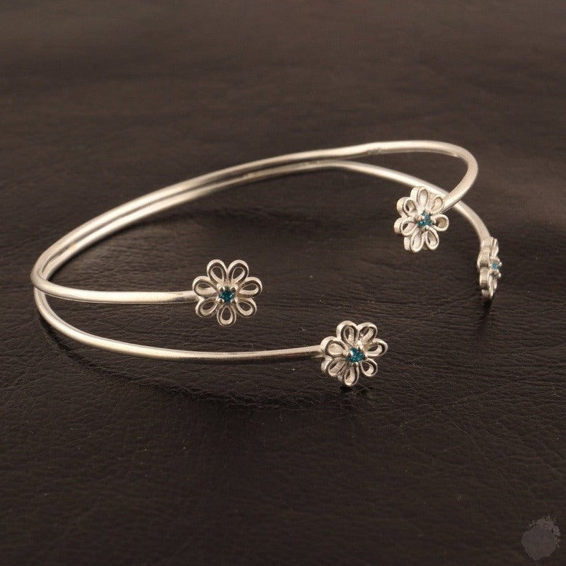 Emerald or a Blue Topaz Four Daisies Bangle