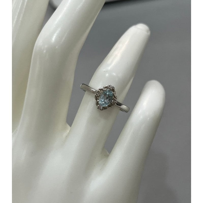 Enigmatic Blue Topaz: Sterling Silver Shiny Ring