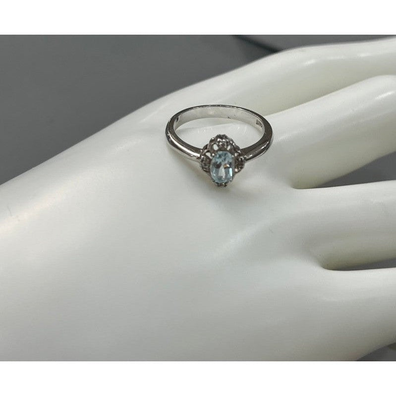 Enigmatic Blue Topaz: Sterling Silver Shiny Ring