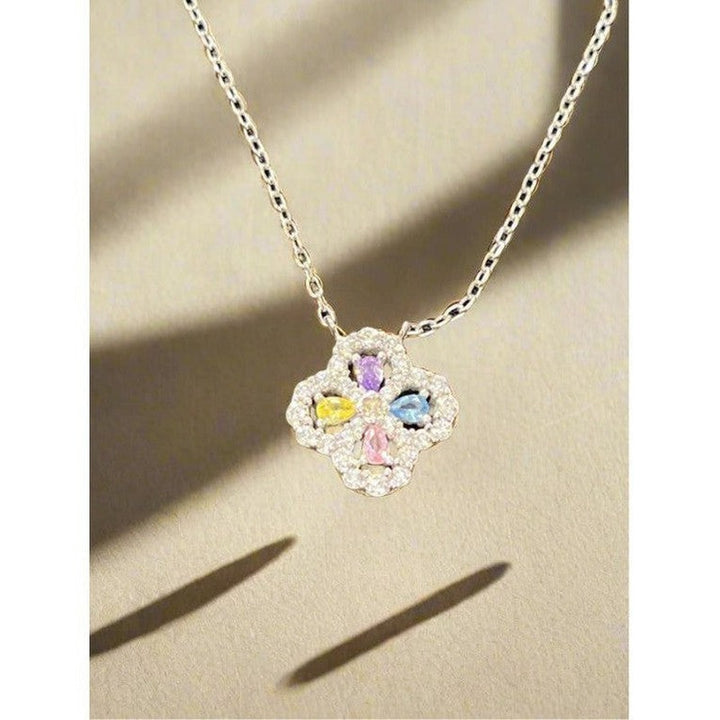 Floral Symphony: Sterling Silver Necklace with Pink, Blue, Purple, and Yellow Flowers