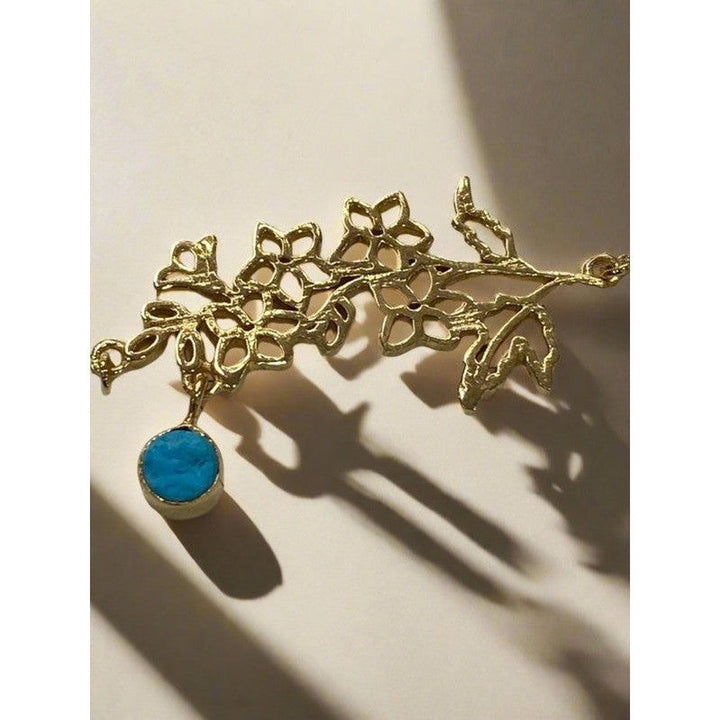 Gold-Plated Necklace with December Turquoise & Blue Topaz Birthstones and Narcissus Flower