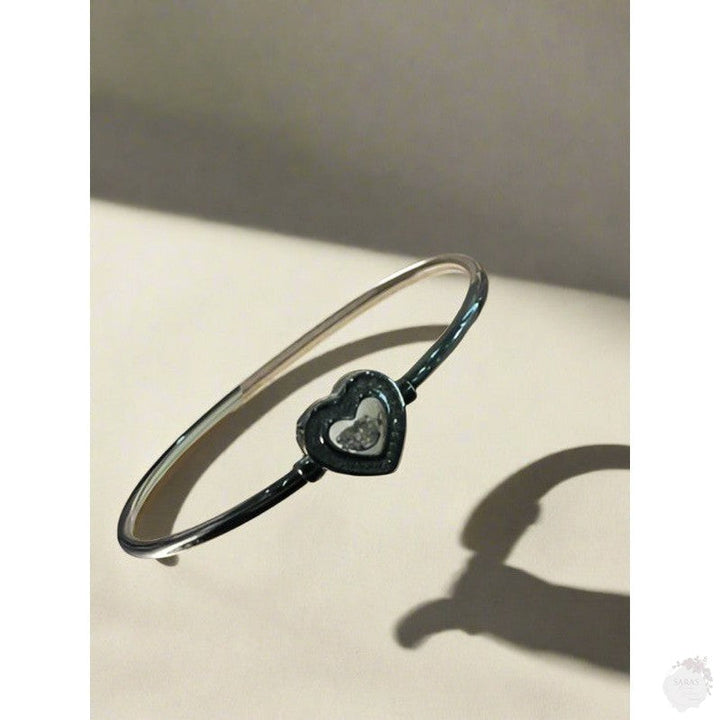 Heartfelt Radiance: Sterling Silver Heart Bangle