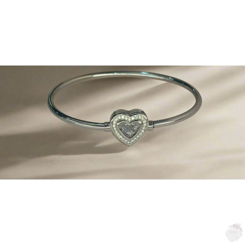 Heartfelt Radiance: Sterling Silver Heart Bangle