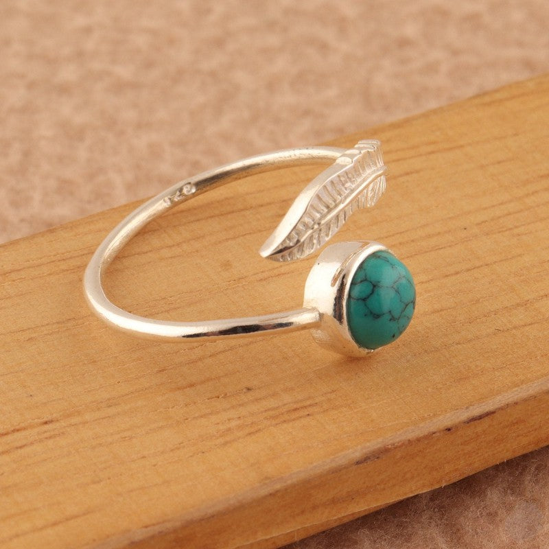 Leaf Motif Ring with a Gem