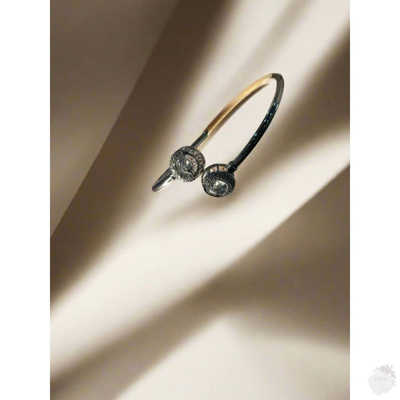 Radiant Circles: Sterling Silver Diamond Bangle