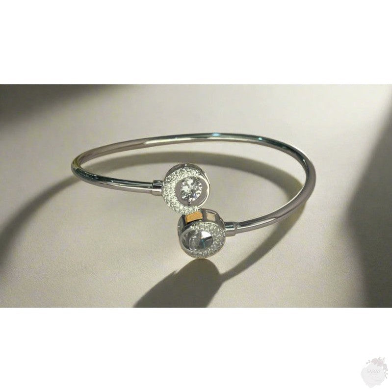 Radiant Circles: Sterling Silver Diamond Bangle