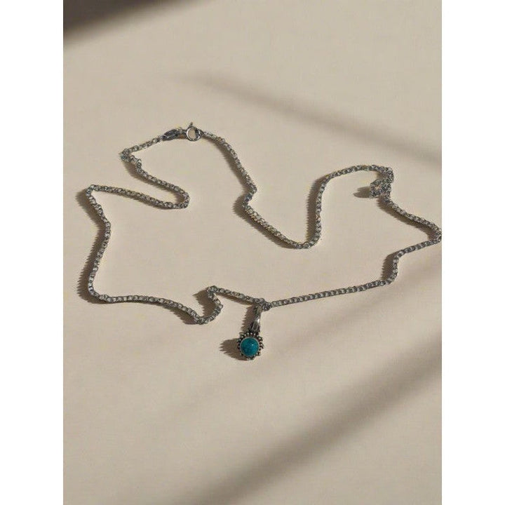 Radiant Turquoise: Sterling Silver Necklace with Sun Vibes