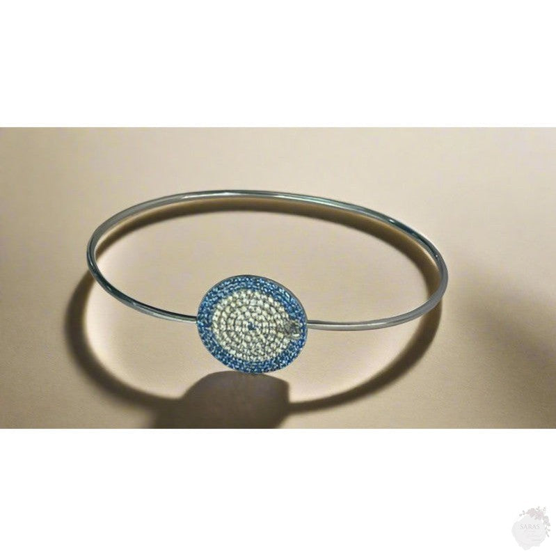 Sapphire Cascade: Sterling Silver Bangle with Blue Zirconia and Diamond Layers